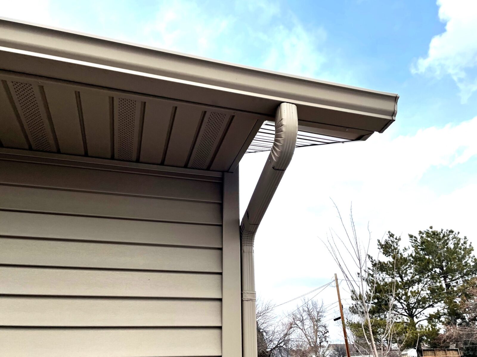 High quality gutter installed on brick house 